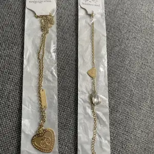 Säljer dessa smycken i Guess halsband och armband ej äkta båda i stainless steel i guldfärg 