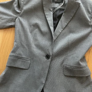 Kavaj grå  - Oanvänd storlek 36