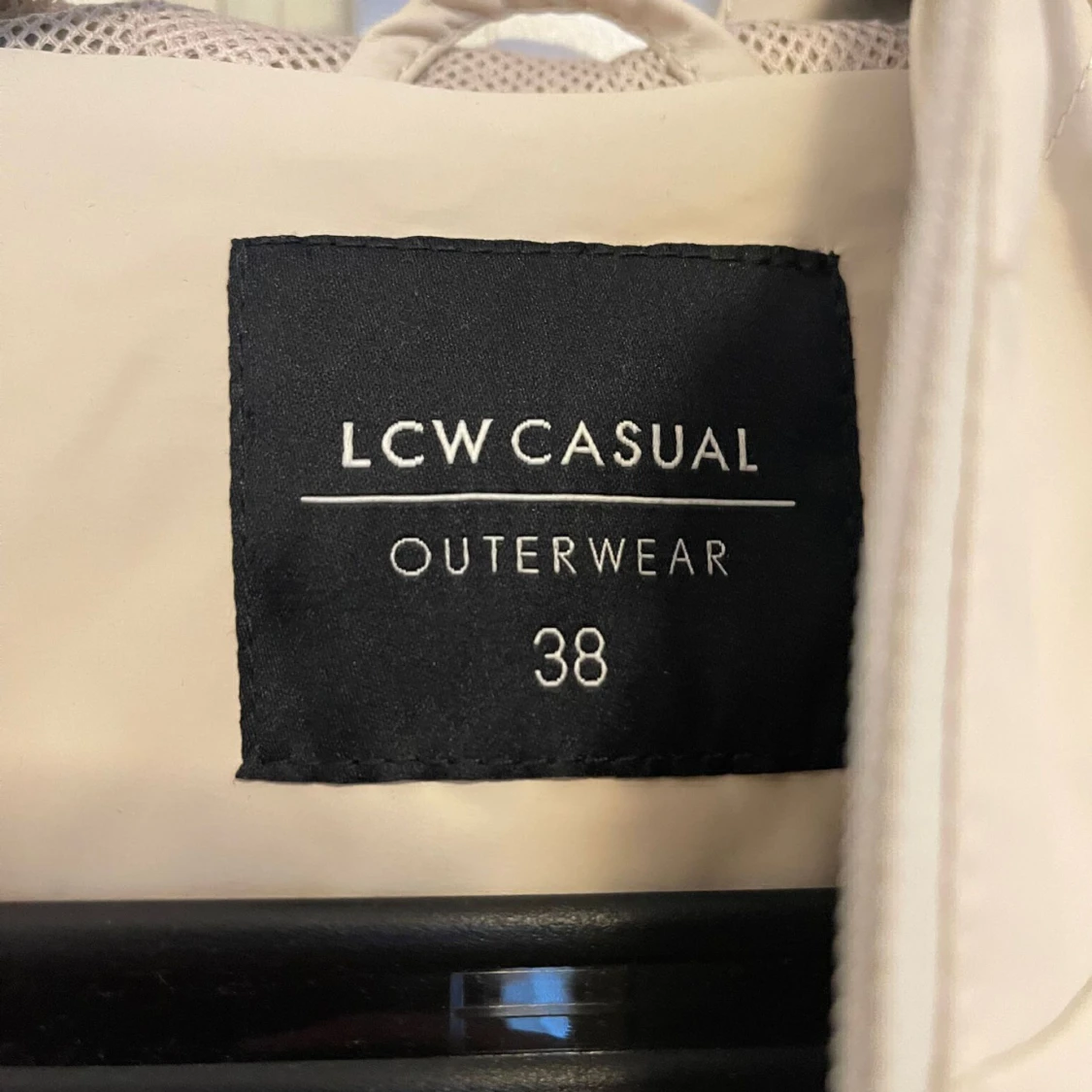 Beige regnjacka - 90