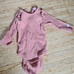 Bodys - Body för bebis strl 62. Oanvänd helt ny utan prislapp