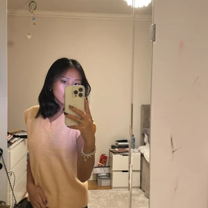 Väst  - Aldrig använd, storlek 14/165 