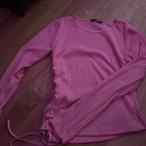 Rosa tröja, den är fåtal gånger använd 