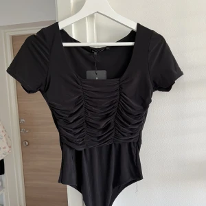 Body  - Aldrig använd. Glansigt material 