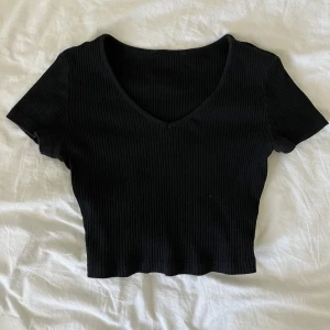 Vringad topp - V-ringad topp