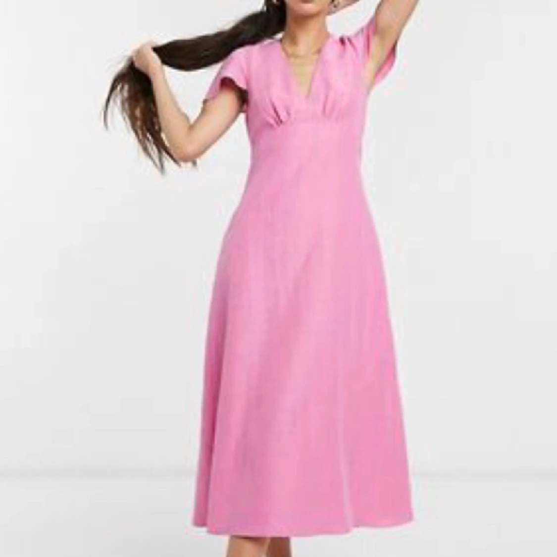 Rosa midiklänning i linne - 90