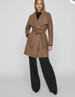 Beige kappa från vila - Fint använt skick 