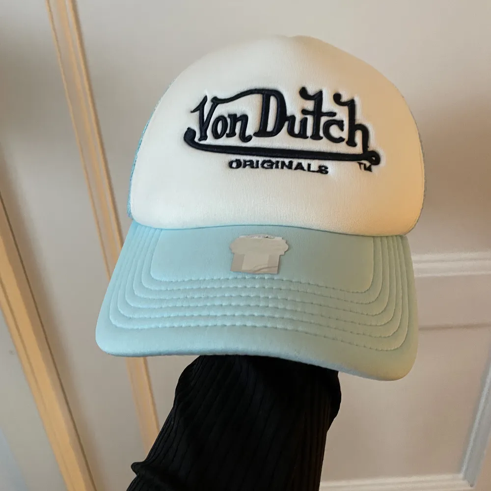 Oanvänd von dutch keps one size. Accessoarer.