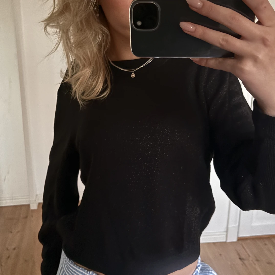 Svart glittrig tröja