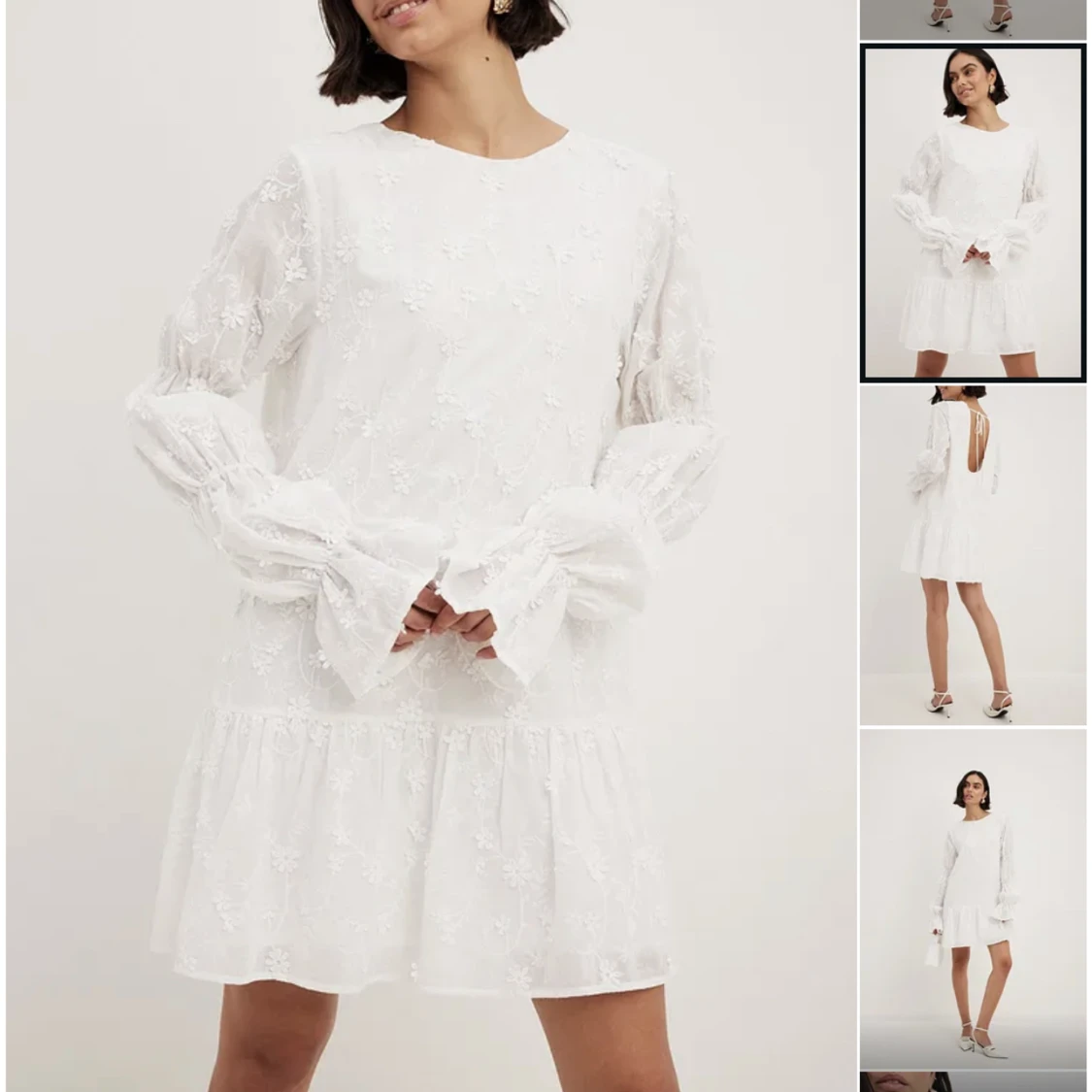 Vit klänning med ärmdetalj