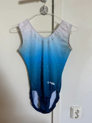Gymnastikdräkt - Gymnastikdräkt från Moreau lite använd i storlek 1/AM
