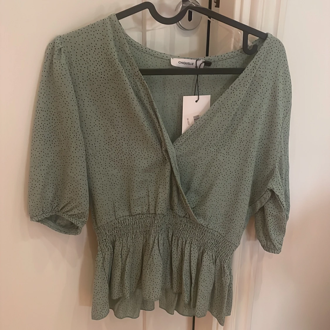 Mönstrad blus  - 90