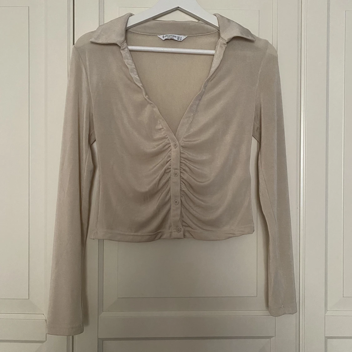Beige topp/skjorta