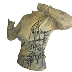 Handgjord mönstrad golf. - Handgjord i tryck och färgning av produkten. Tyget är stretchigt. Artikeln är ny.