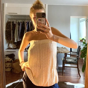 Kjol / topp - Jättefin tubkjol som kan bäras som topp. Cremevit hålstickad. 