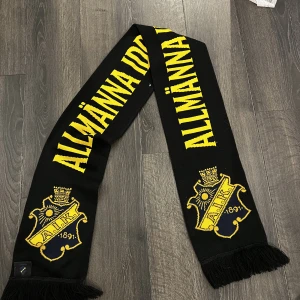 Aik halsduk - Använd på två matcher. 