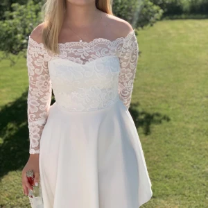 Studentklänning - Endast använd en gång på studenten. Nyskick.