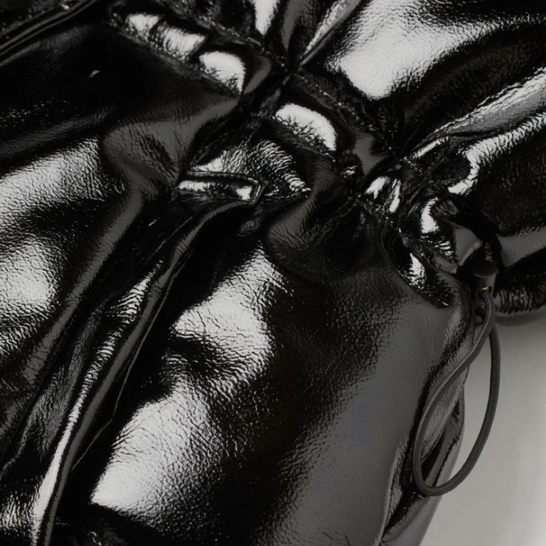 Svart glansig väst från HM - 90