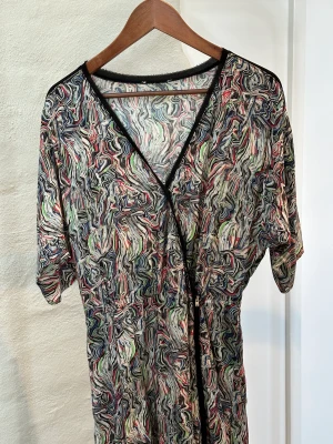 Cocktailklänning  - Cocktailklänning från House of Dagmar stl40 (M)