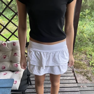 Minikjol - Minikjol volanger , lågmidjad