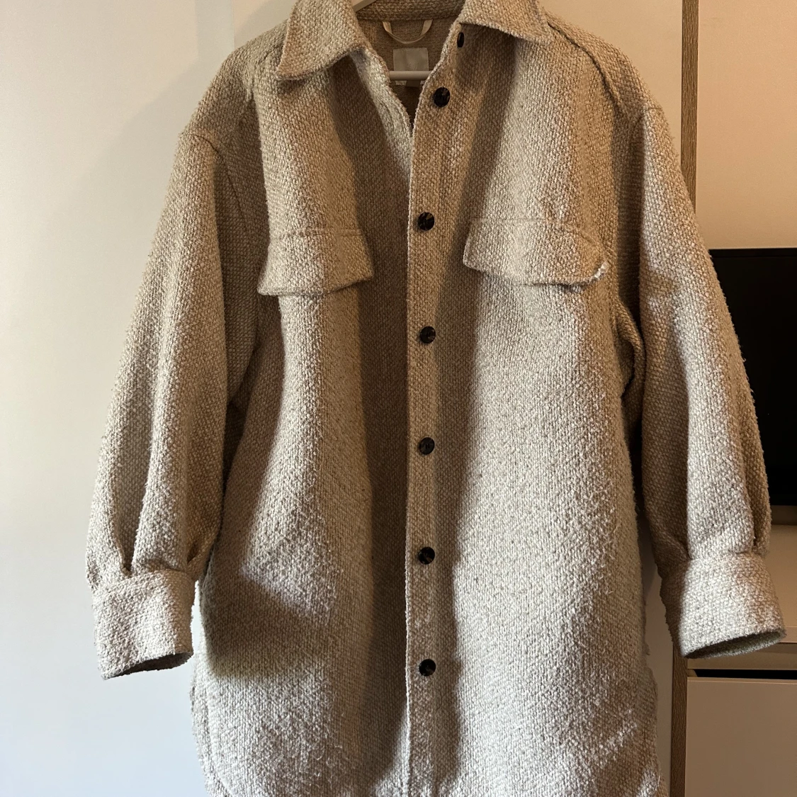 Beige kappa från H&M