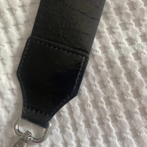 Axelrem för väska - längd ca 110cm.