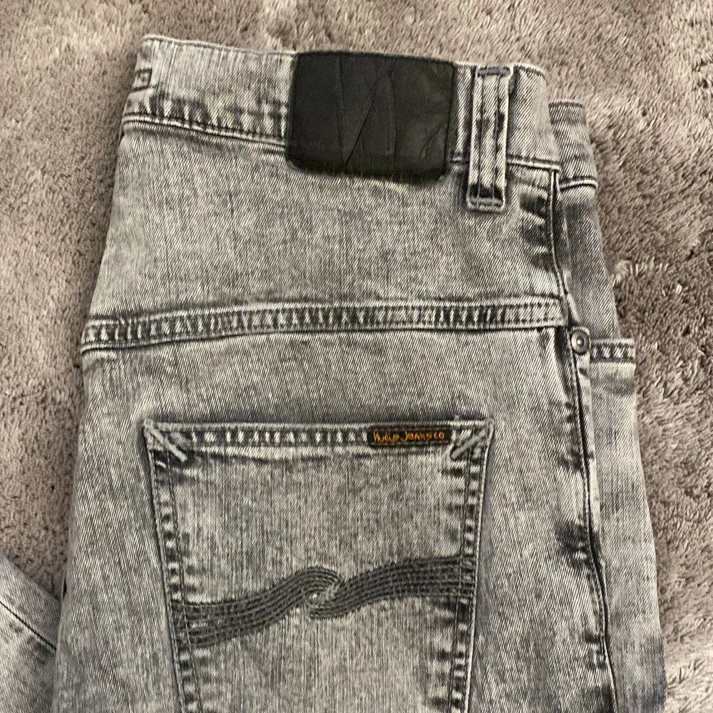 Säljer nu dessa sjukt snygga Jeans från Nudie i storlek 31/32 ,Skick 9/10, inga defekter. Pris: 299 kr, kan diskuteras vid snabb affär!. Jeans & Byxor.