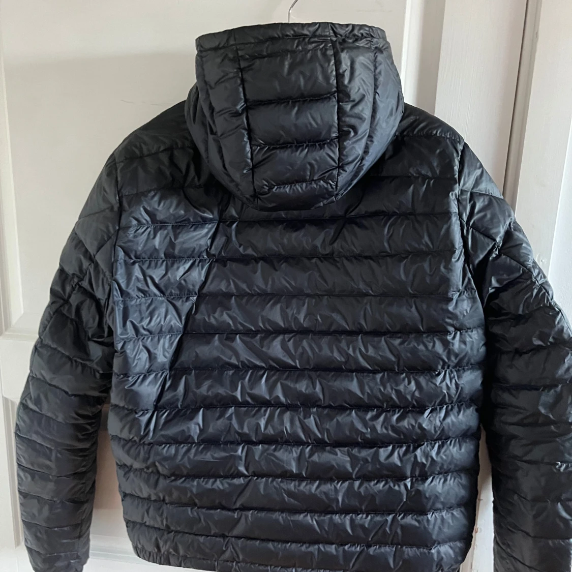 Svart dunjacka från Moncler - 90