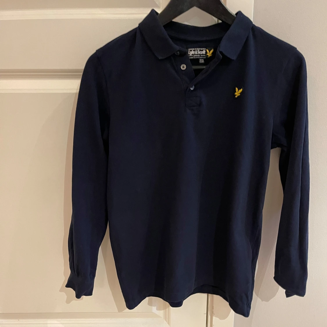 Mörkblå pikétröja från Lyle & Scott - 92