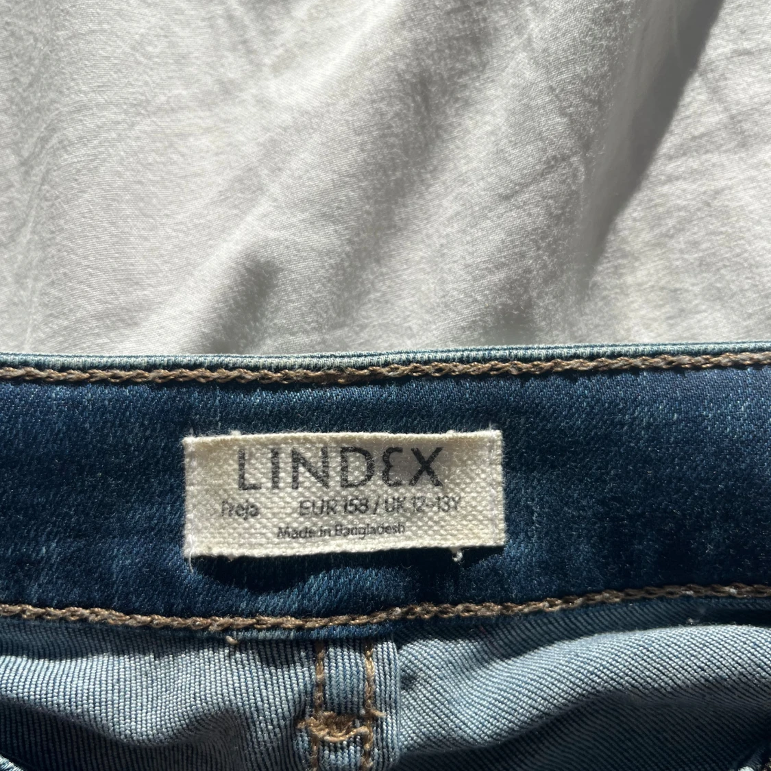 Blå bootcut jeans från Lindex - 2