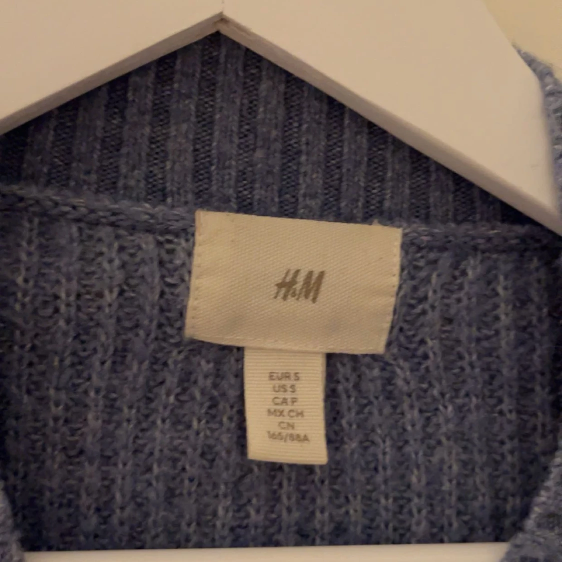 Blå stickad tröja - 1