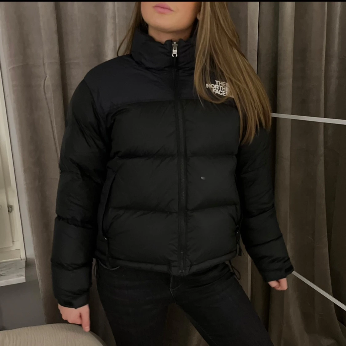 Svart dunjacka från The North Face