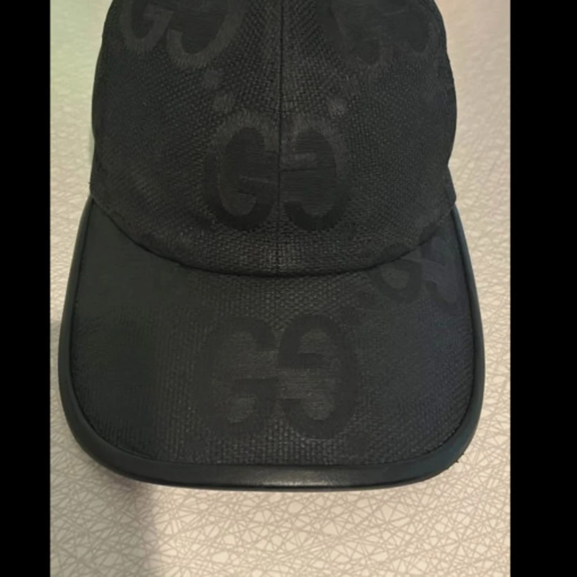 Svart keps från Gucci