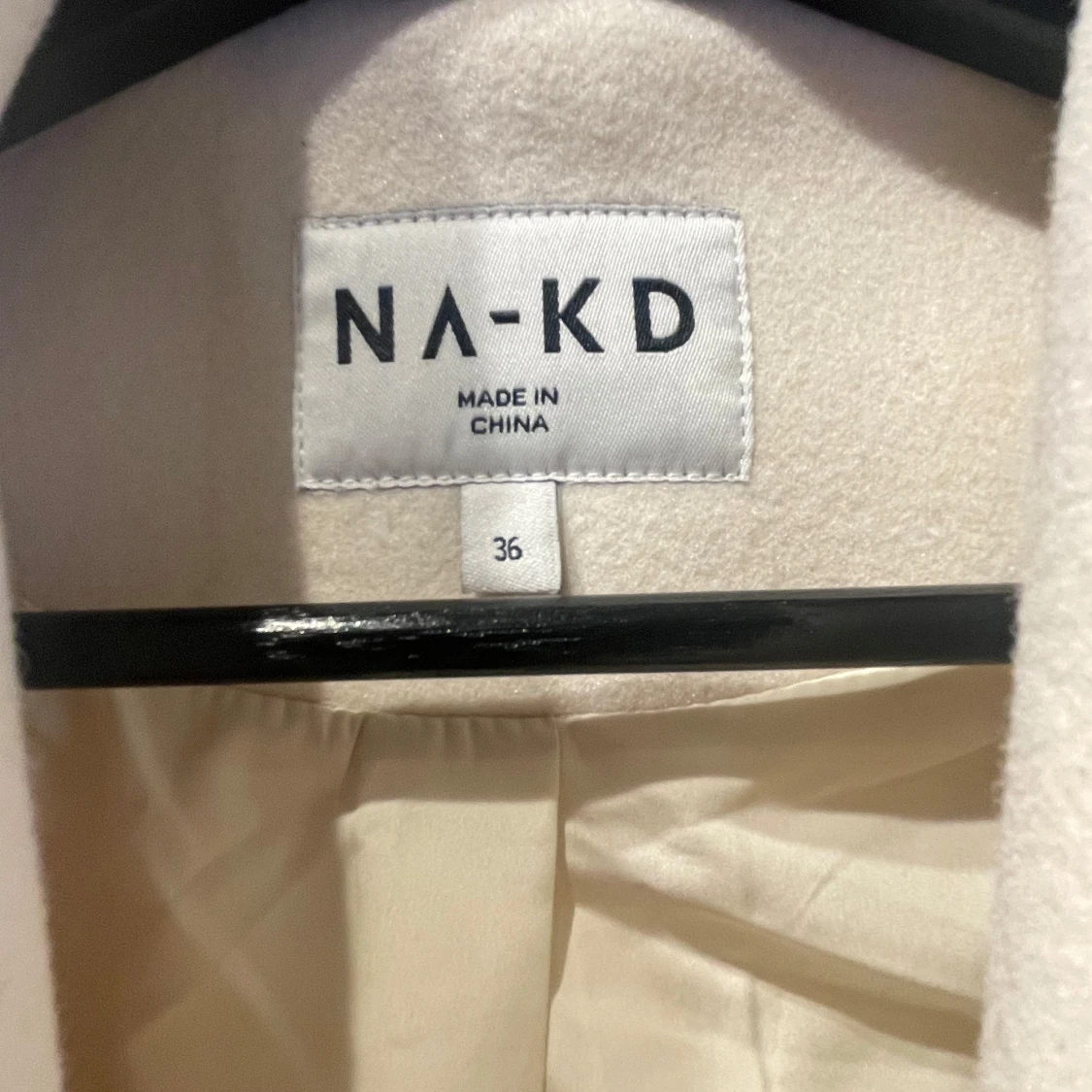 Vit kappa från NA-KD - 90