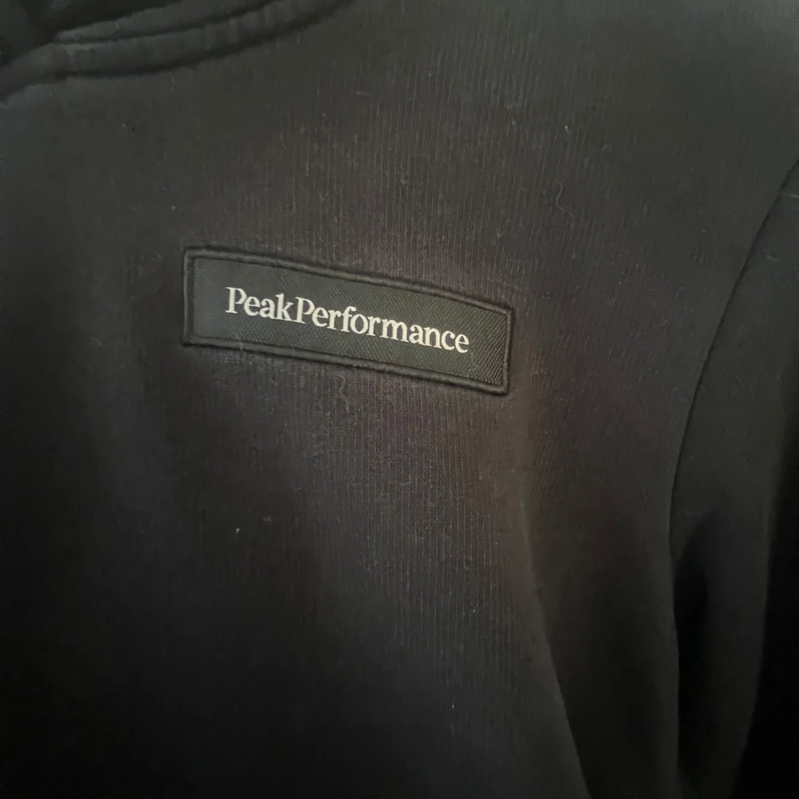 Svart hoodie från Peak Performance - 91