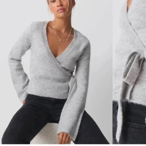 Grå omlottstickad tröja - Säljer en supermysig grå omlottstickad tröja med långa ärmar. Perfekt för höst och vinter. Den är helt ny med prislapp 