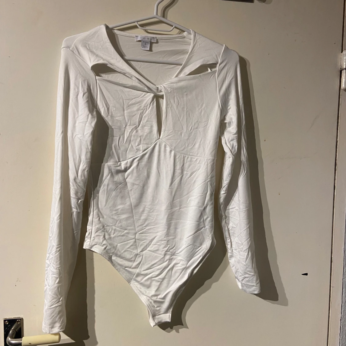 Vit långärmad bodysuit från Amisu