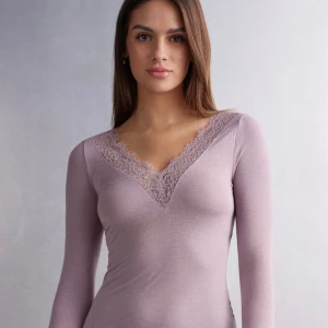 Intimissmi tröja med spets - Jättefin ljuslila intimissmi tröja som är sparsamt använd💗