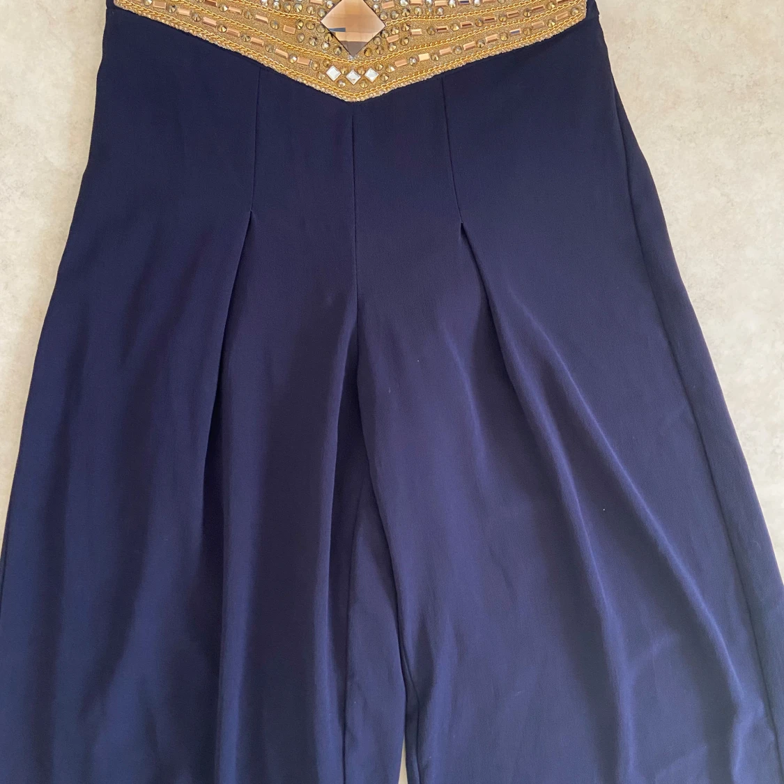 Marinblå byxor L  - 90