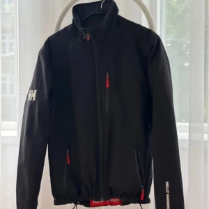 Helly Hansen Jacka  - Svart - Bra skick - Storlek S 