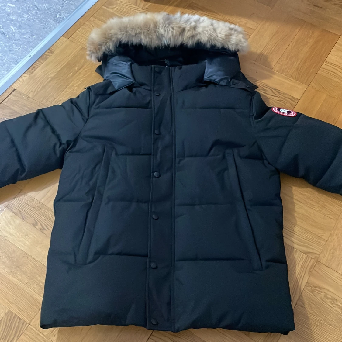 Svart dunjacka från Canada Goose