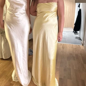 Gul balklänning bandeau - Gul balklänning bandeau med öppen rygg
