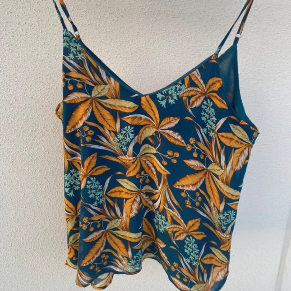 Orange blått mönstrat linne