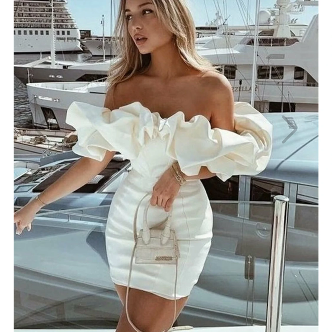 Vit axelbandslös klänning Dennis maglic