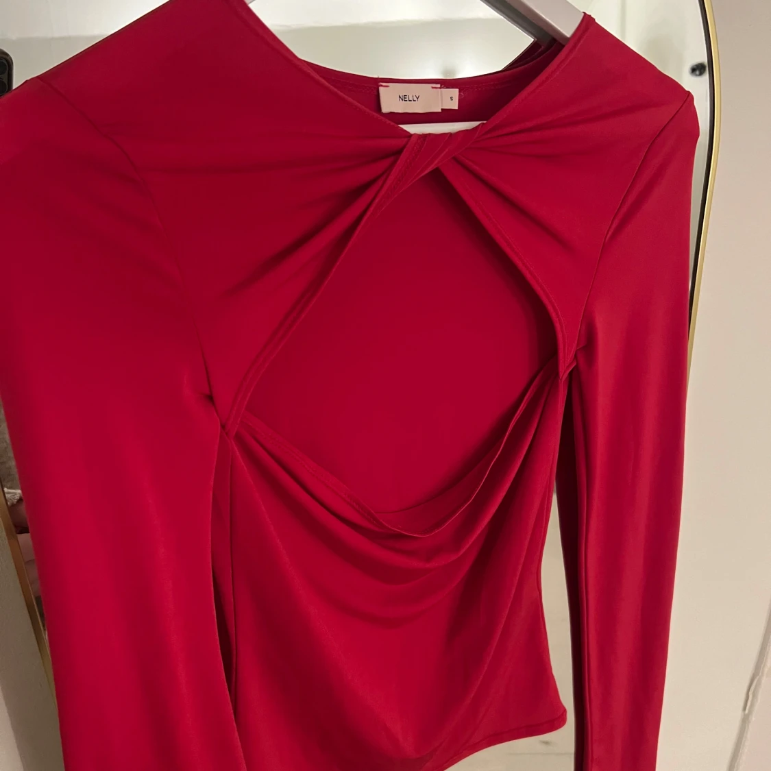 Röd långärmad topp från Nelly - 90