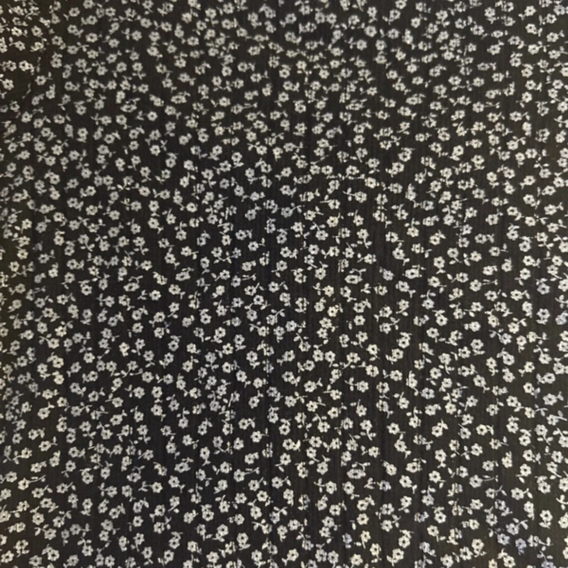 Svart blommig topp med knappar Brandy Melville - 91