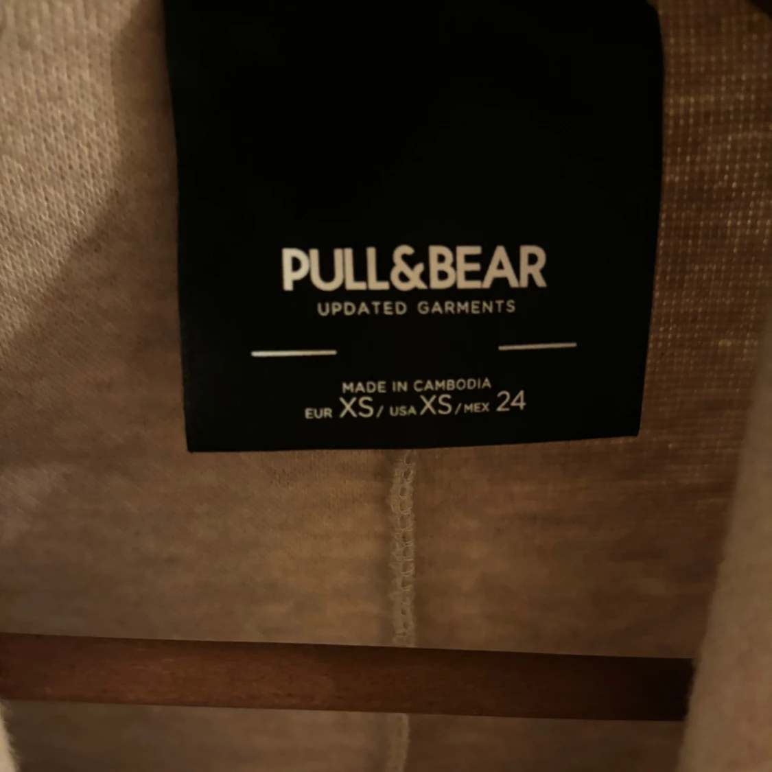 Beige kappa från Pull&Bear - 92
