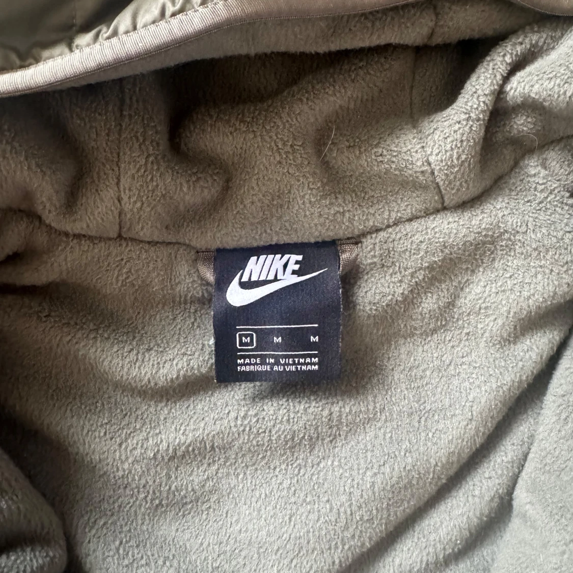 Grön quiltad jacka från Nike - 92