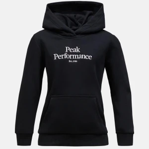 Svart hoodie från Peak Performance - Säljer en stilren svart hoodie från Peak Performance med vit logga på bröstet. Den har en klassisk känguruficka och en mysig huva. Mycket värmande. Säljer denna då jag har slutat andvända hoodies.