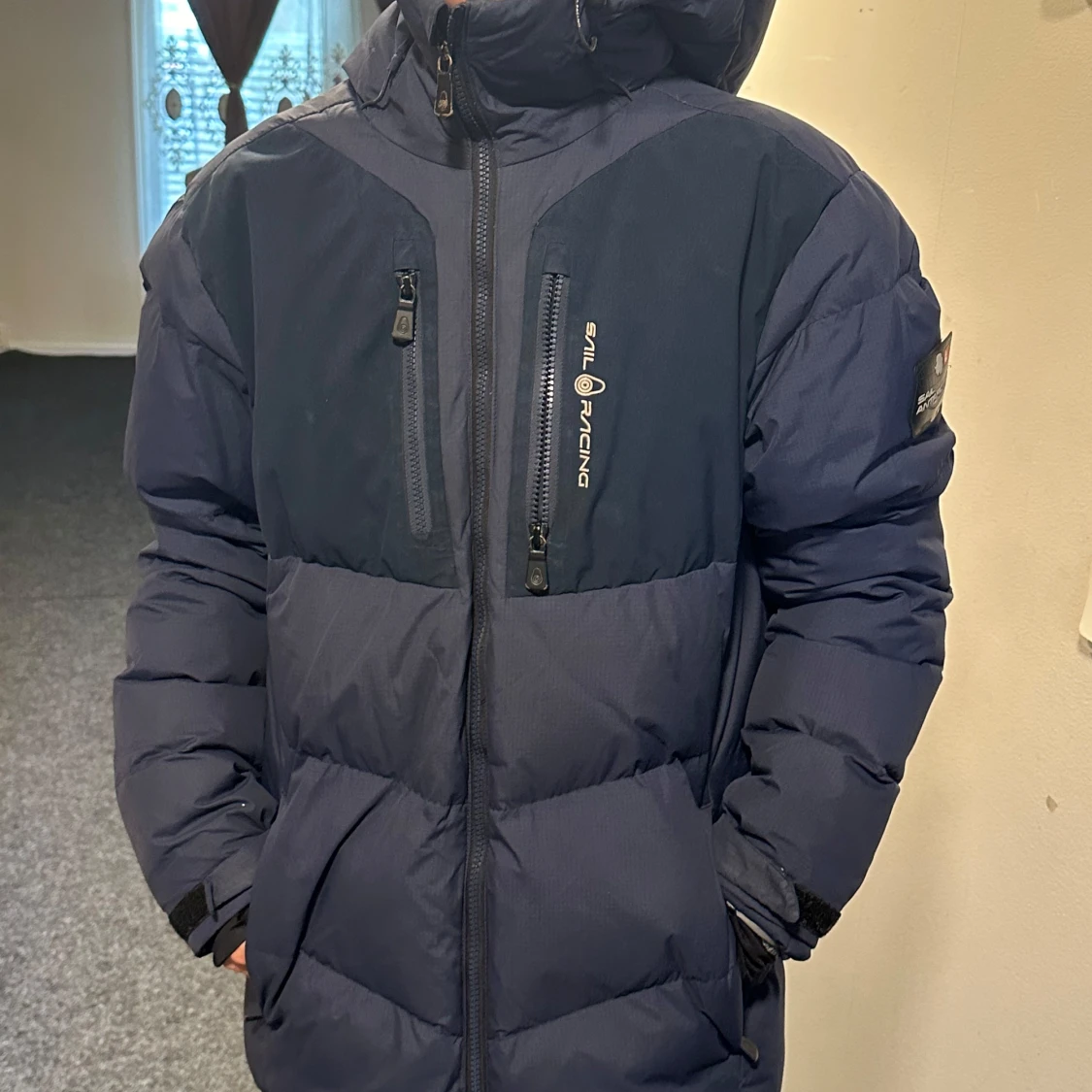 Mörkblå pufferjacka från Sail Racing - 91