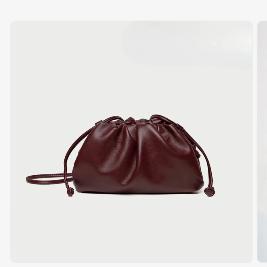 Clutch väska vinröd i skinn